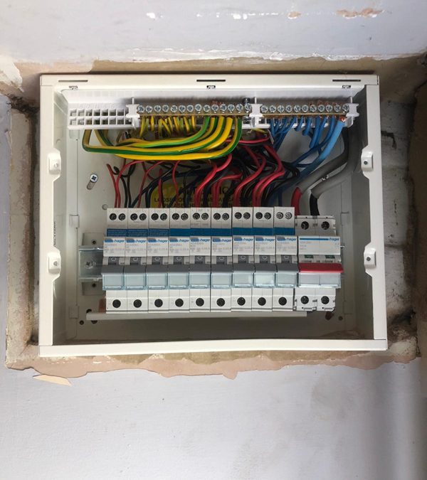 Electrician Installation Of A Fuse Board In Thame