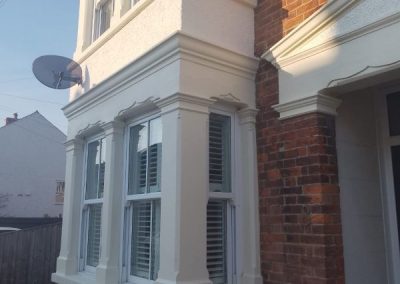 Repaired cracks and painted front of house in Aylesbury